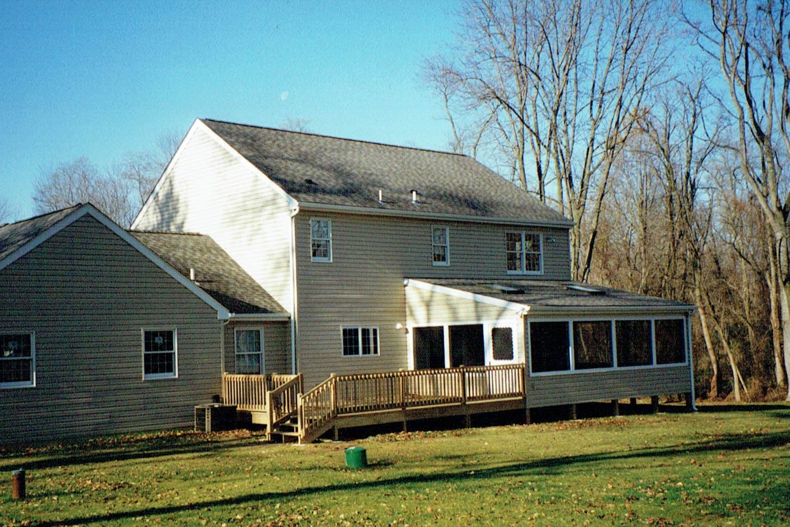 a screened in porch and pressure treated deck in media, pa 19063 built by deluca construction